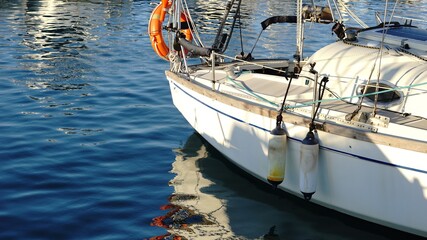 Fototapeta na wymiar bumper buoys on moored sailboat