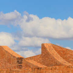 Fototapeta na wymiar architecture brick wall with sky background