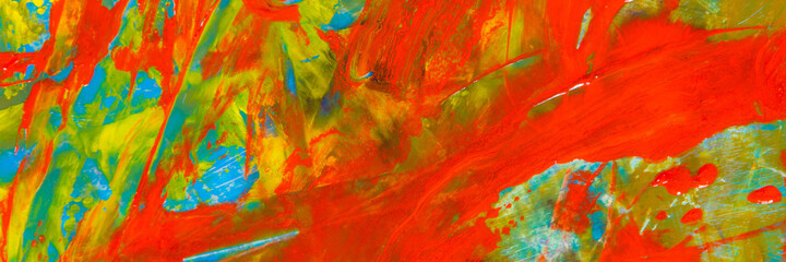 colorful creative motley background: smudged residues of oil paints on a wooden palette, short focus, selective blur