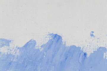 creative background, stain of colored primer rubbed on the surface of a linen canvas, temporary...