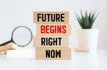 Conceptual hand writing Future begins right now text. on wooden block