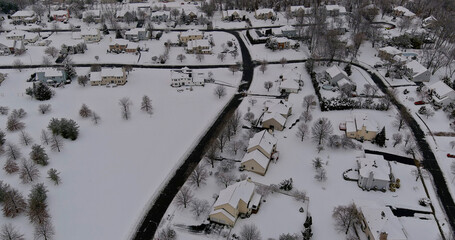 Residential small town snowy during a winter after snow storm on wonderful winter scenery with houses the aerial view