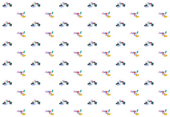 blue, yellow and red colored threads on a bobbin on a white isolated background