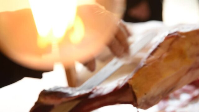 Cutting serrano ham