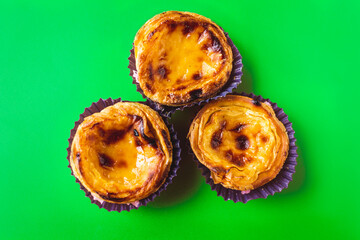 Top view of typical Portuguese dessert pastry Pastéis de Nata - Portuguese egg custard tart, with...