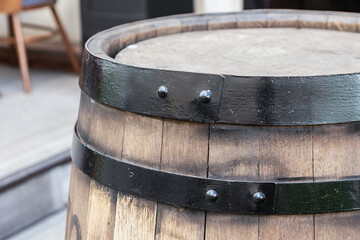 oak barrel upright with iron rings hoop close up