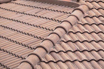Clay roof of the house is dark brown background ribbed base
