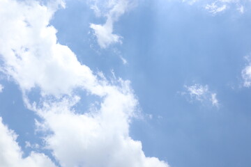 clear blue sky with white clouds
