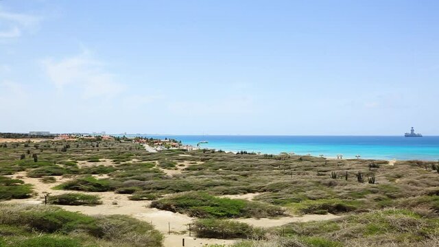 Natural beauty of Aruba. North coast. Off-road Aruba. Amazing stone desert landscape, blue sea and blue sky.	