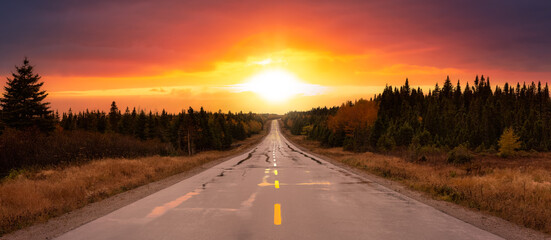 Scenic highway during a vibrant sunny day in the fall season. Colorful and Dramatic Sunset Sky Art...