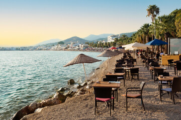 View of restaurant or cafe on beach in  Bodrum city of Turkey.