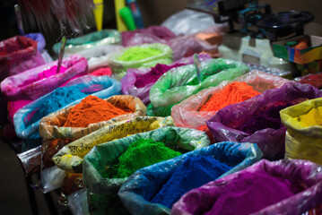 Exhibit colorful powder in a bag for sell for sell during Indian traditional festival holi