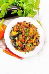 Ragout with eggplant and pepper on light board top