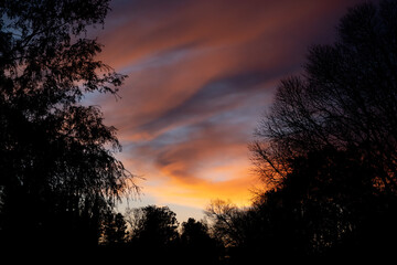 Sunset colors framed copy-space, mostly orange color with dashes of blue