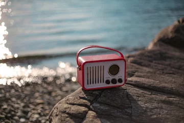 old radio on the beach © Andrine