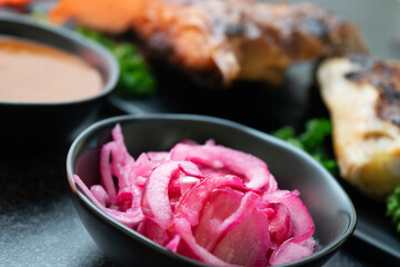 purple onion, sauce & chicken