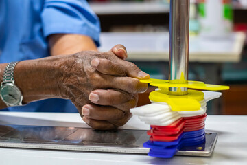 Occupational therapy: hand function training in a stroke patient by using single curve metal pipe and pinto improve their hand rehabilitation.