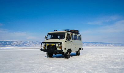 Van UAZ Parked on Ice in Winter. Transport at Baikal Lake in Russia
