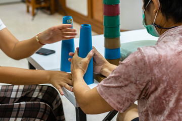 Occupational therapy: hand function training in stroke patient by using stacking cone.