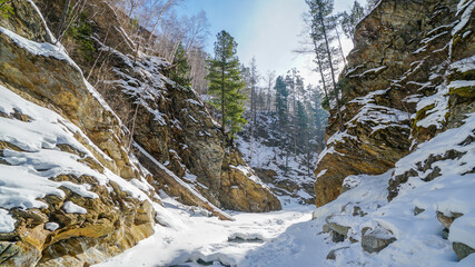 Deep Gorge in Winter. River Canyon Covered with Snow