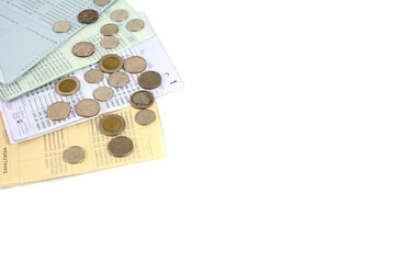 Passbook and coin on the white background.