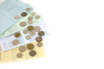 Passbook and coin on the white background.