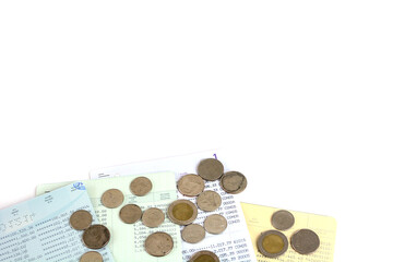 Passbook and coin on the white background.