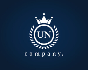 Letter UN, U or N elegant crown emblem. Calligraphy laurel wreath crown monogram. Royal style initials letter logo. Graceful design for Restaurant, Cafe, Brand name, Badge, Label, Product, label.