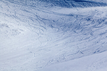 Dombai ski resort, on the ski slope, snowboard traces