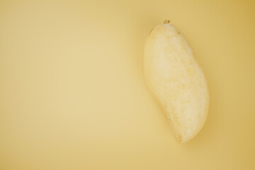 Yellow mango. Thai fruit favorite on yellow background