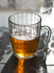 Old Soviet beer mug with beer.