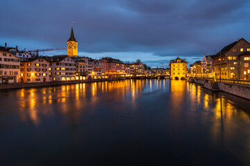 A view from Münstrebrücker on the riverside in Zürich at night