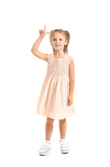 Cute little girl with raised index finger on white background