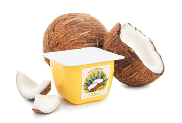 Tasty coconut yogurt on white background