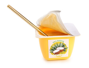 Plastic cup of coconut yogurt on white background
