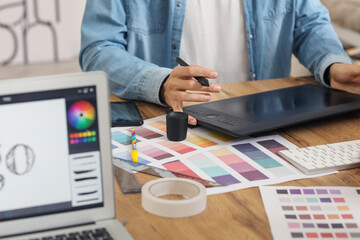 Graphic designer working in office