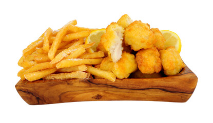 Tempura battered chicken nuggets and French fries in an olive wood serving dish isolated on a white background