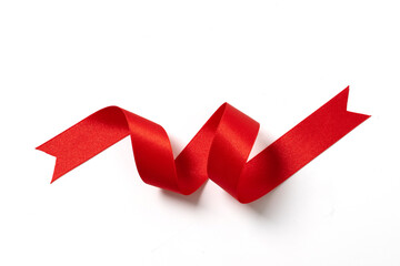 A roll red ribbon isolated on white - 423475459