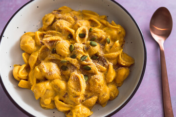 vegan mac and cheese pasta with pumpkin cashew sauce, healthy plant-based food
