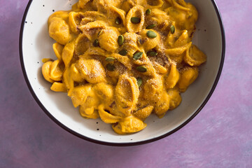 vegan mac and cheese pasta with pumpkin cashew sauce, healthy plant-based food
