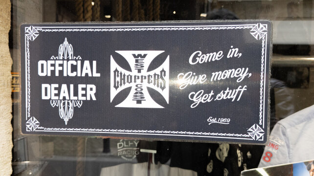 West coast choppers official dealer logo cross text and brand sign of motorcycle design
