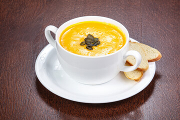 Tasty pumpkin soup with seeds