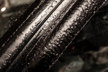 Ice on the car. Rain