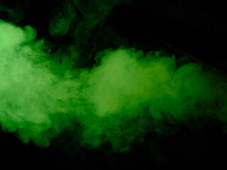 Green smoke texture on black background