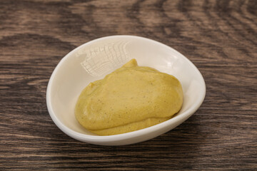Dijon mustard sauce in the bowl