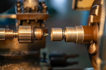  lathe machine or Turning machine drilling the metal rod with the drill tool and center drill tool.