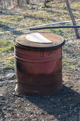 Naklejka premium a wood oven made of an old oil barrel