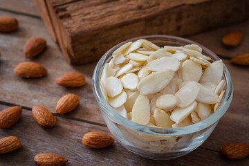 Almond slices in glass bowl.