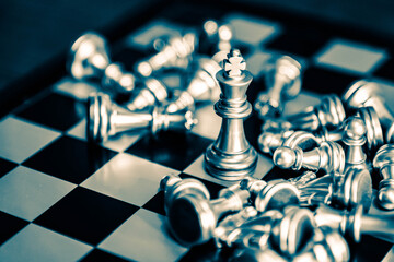 Chess board game to represent the business strategy with competition in the world market. and find...