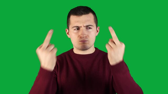 disgruntled man showing bad gesture with fingers on green screen